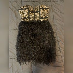 13: Gianni Bini mini feathered dress